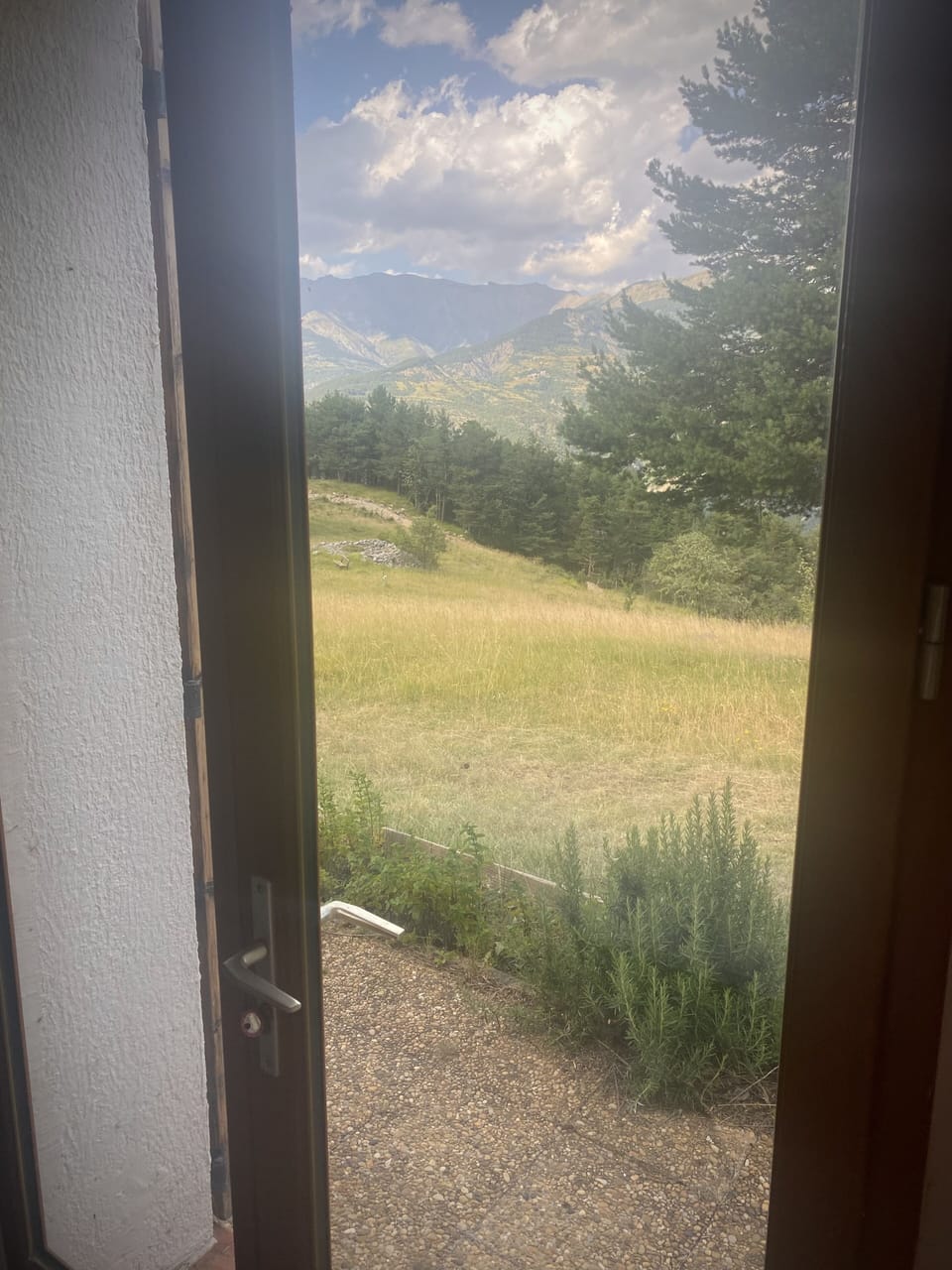 Bedroom door opening to the outdoor