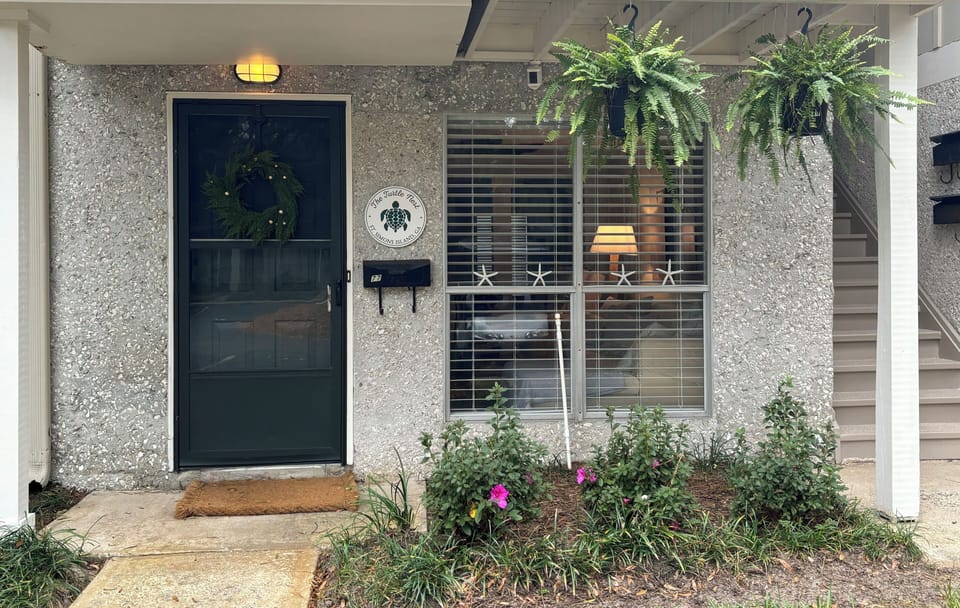 Front of condo….10 steps from assigned parking spot!