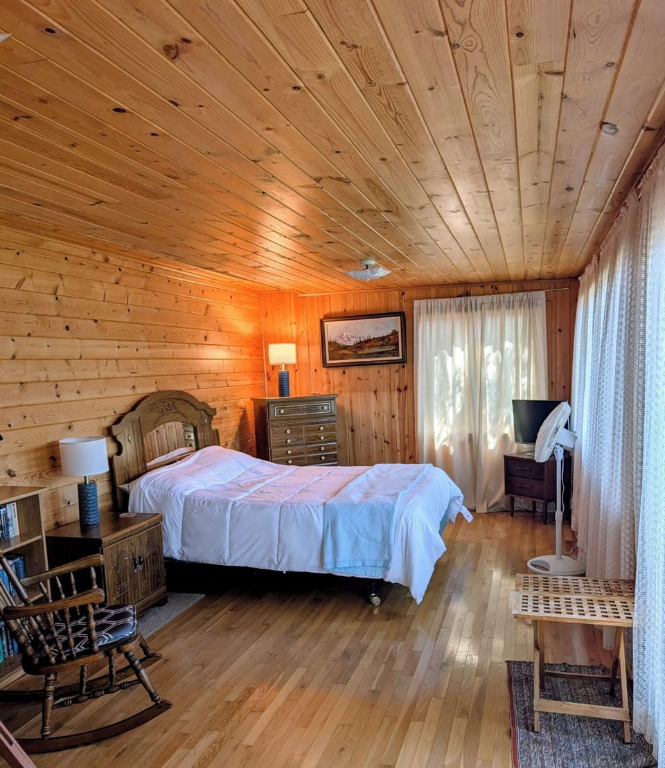 Very private bedroom with lots of windows