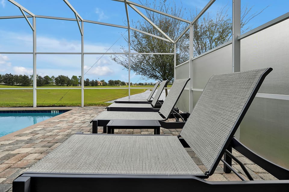 More loungers and a spacious deck—ideal for sunbathing or winding down after the parks.