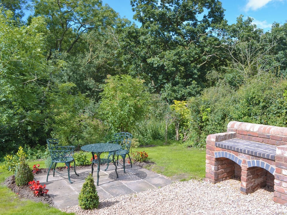 Charming garden | Shepherds Lodge - Morrells Wood Farm, Leighton, near Shrewsbury