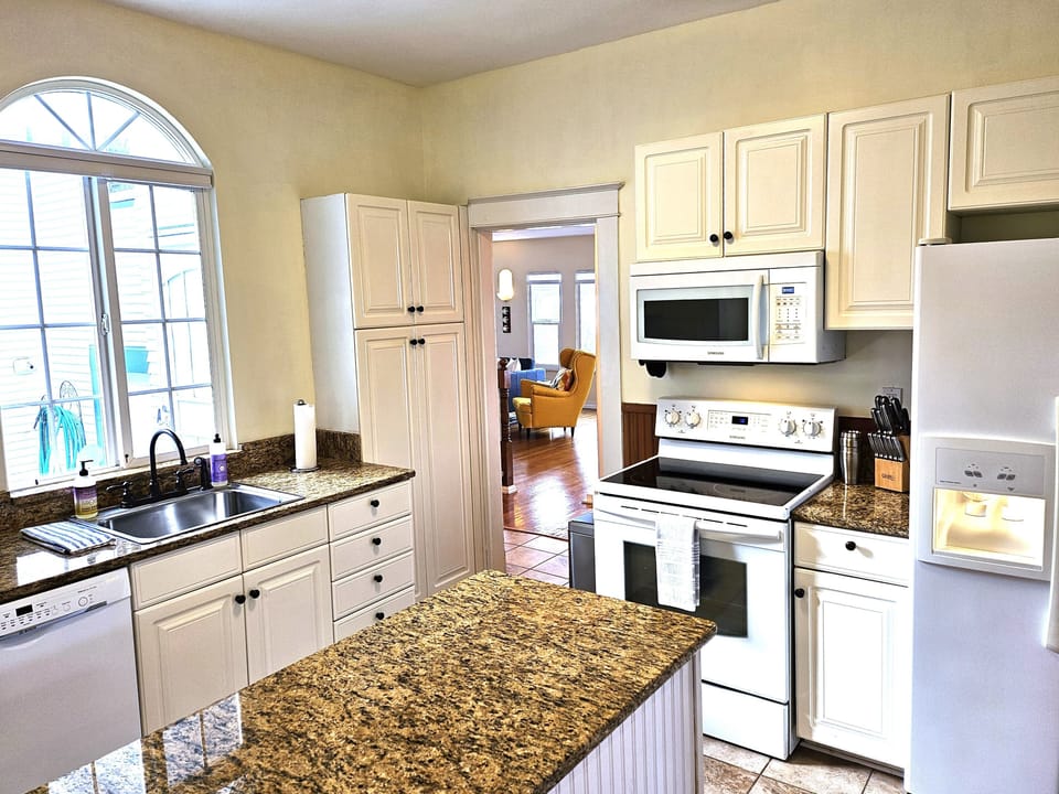 Full kitchen complete with a wide array of amenities.