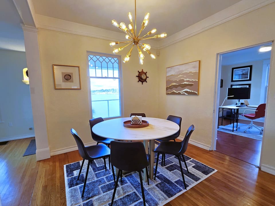 6-person dining table with mountain and water views.