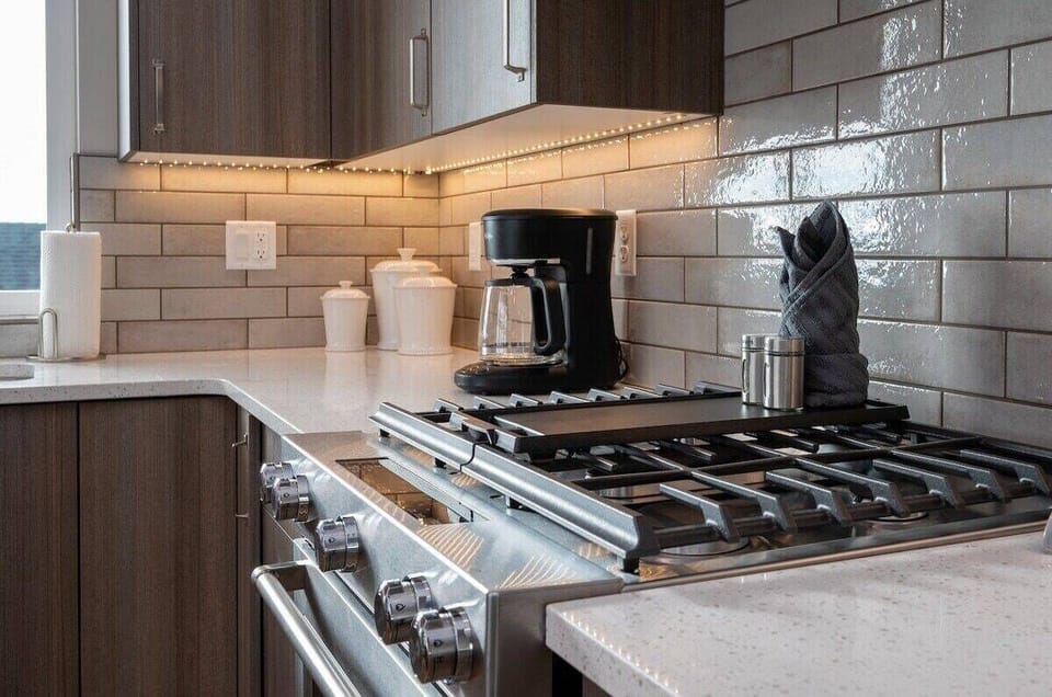 Cook your favorite meals in a kitchen bathed in natural light that enhance the culinary experience.