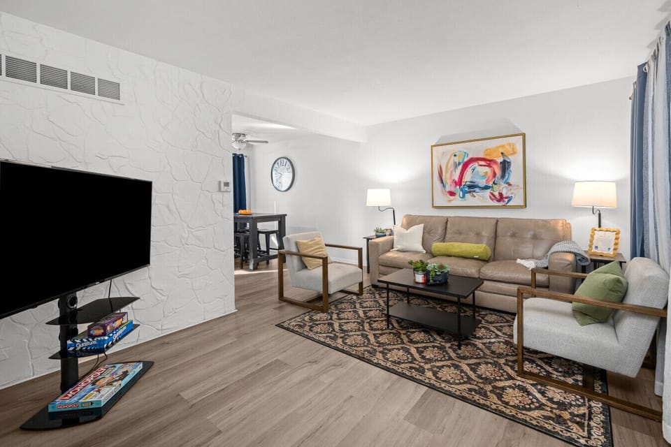 Step inside our cozy two bedroom apartment. Enjoy homey touches, fully-stocked kitchen, and plenty of storage space for a short or long stay!