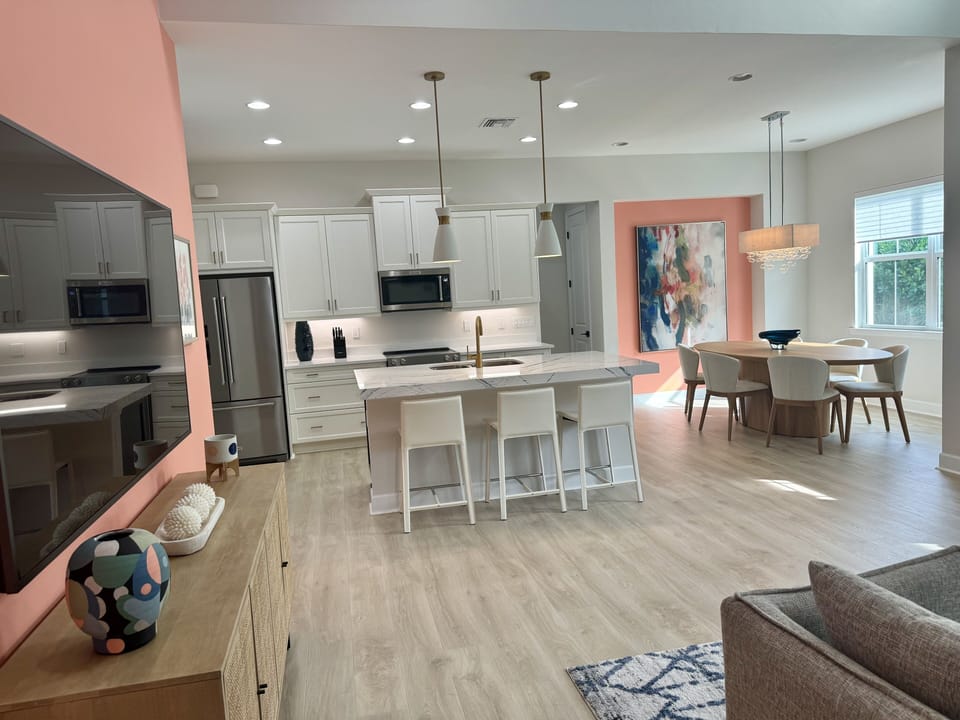 75" TV viewed from Living, Kitchen, Dining Rooms