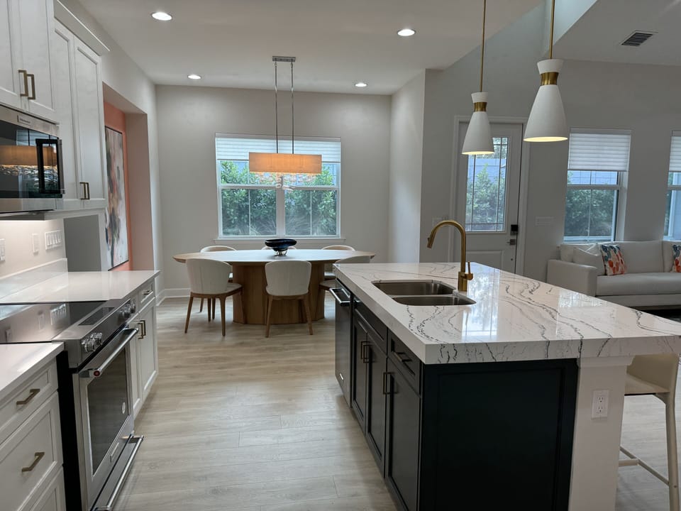 Hi-end appliances, large Island with 3 Counter Stools
