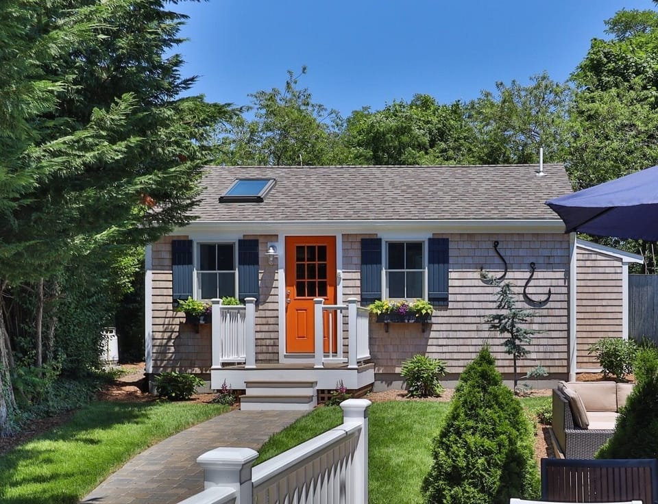 The View from the street with private walkway from parking area 