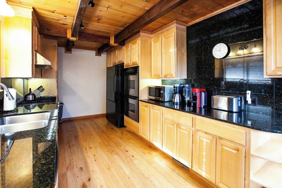 MAIN HOUSE - Fully equipped kitchen with gas range, double stoves, full sized refrigerator, dishwasher, microwave, drip coffee, Nespresso, tea kettle, knives and toaster. 