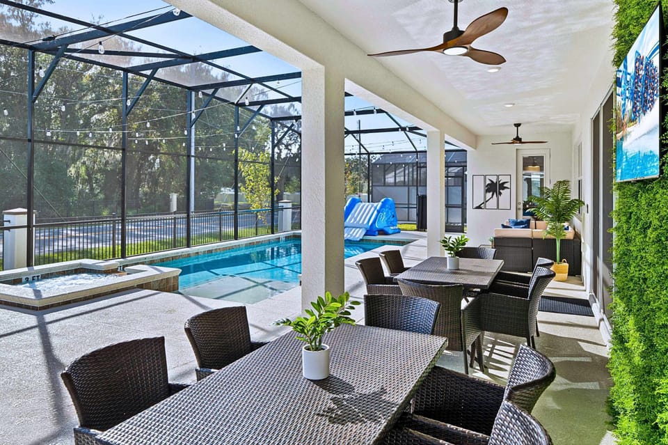 Poolside Dining Area with Wall Mounted TVs