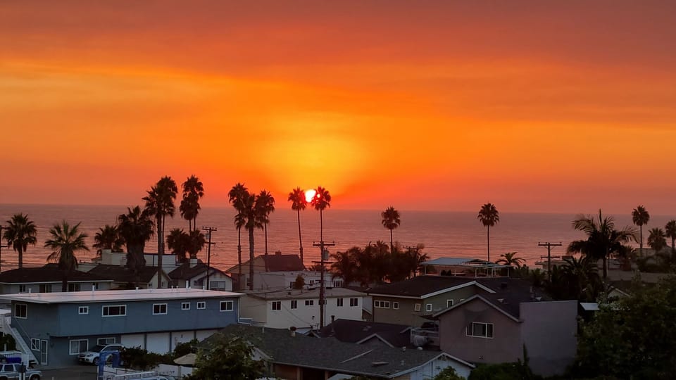 Sunset view from private rooftop deck.