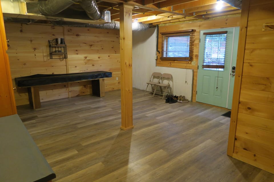 Basement entry, shuffleboard table