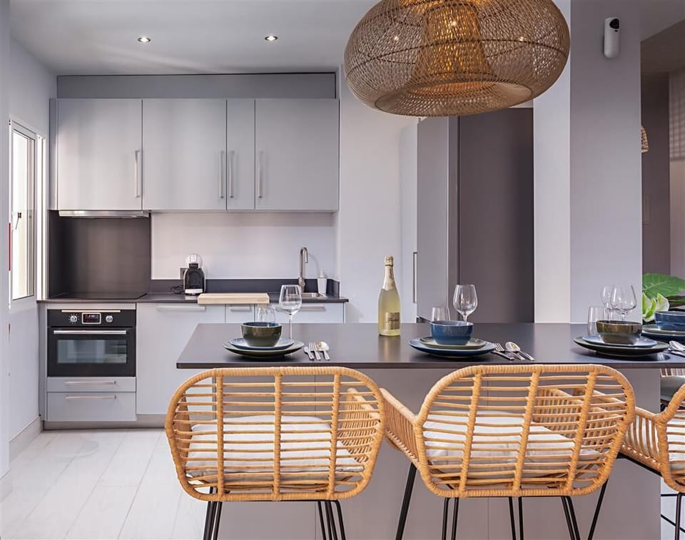 View of the modern open kitchen with dining bar
