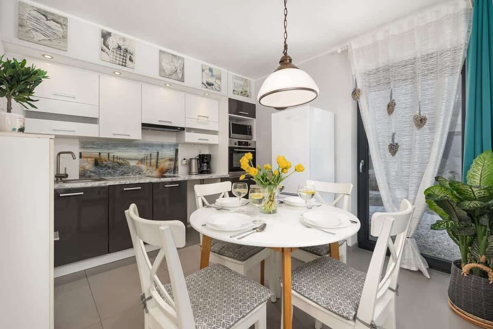 The fully equipped kitchenette includes everything you need for a home-cooked meal.