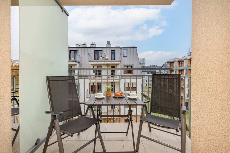 The balcony provides a tranquil spot for enjoying a book. 