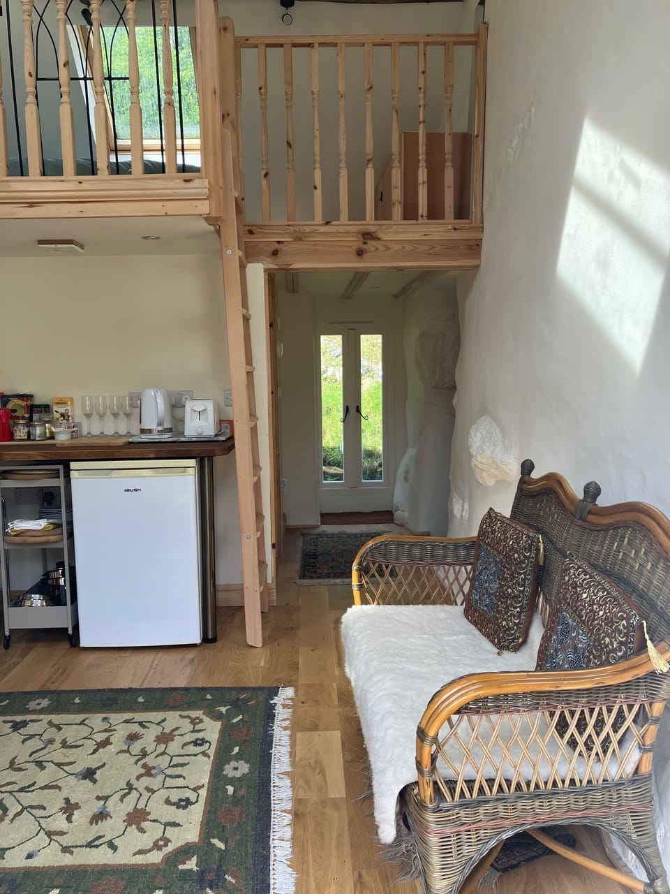 From the sitting room to the back hall and bedroom two access