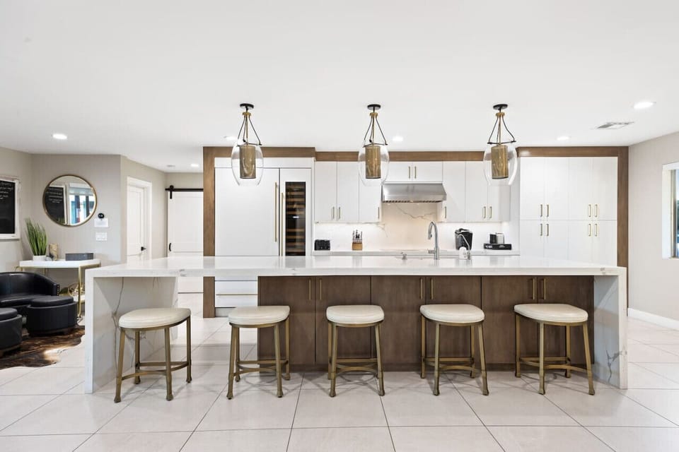 Modern kitchen with oversized island and plenty of bar seating.