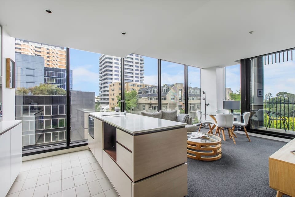 The sleek kitchen allows you to whip up a feast at home on high-quality appliances and cooking utensils.
