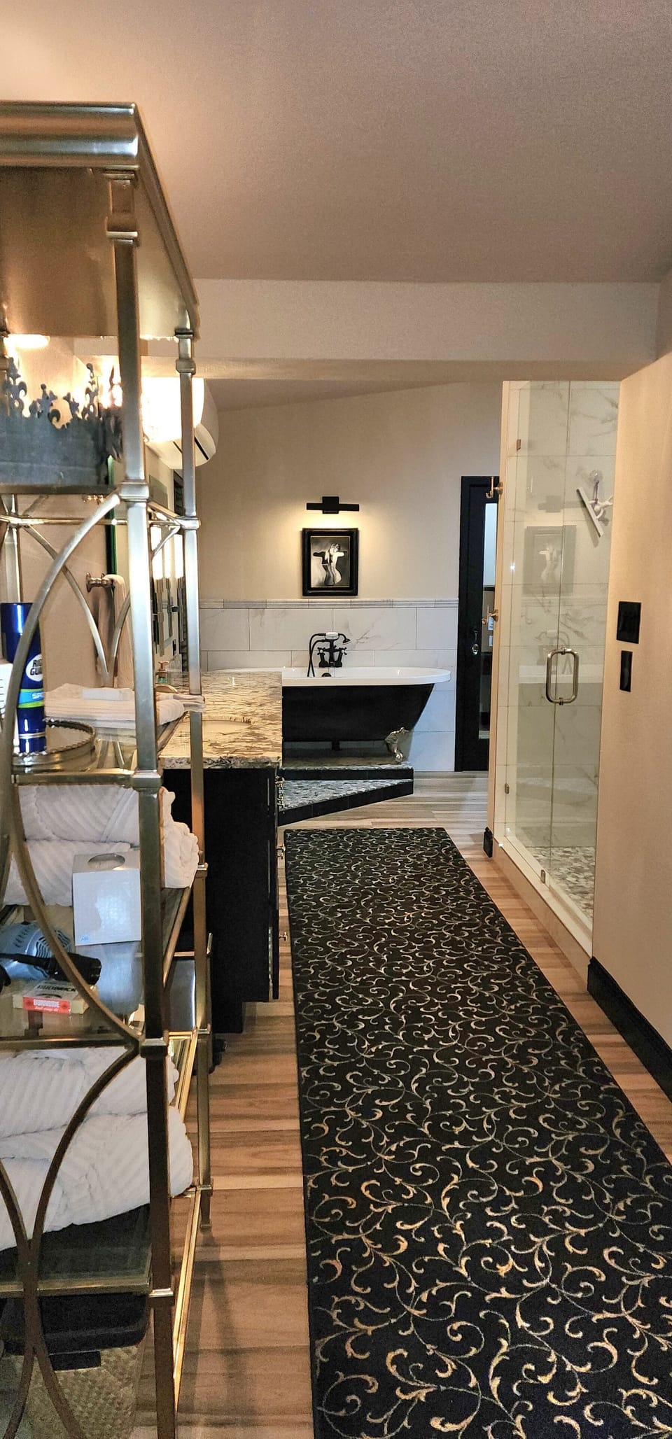 Master bath with claw foot tub. We supply the bath bombs.