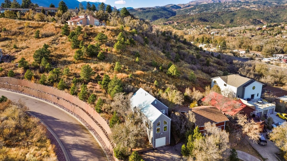 Birdseye view of Red Rocks Retreat and private Mountain backyard.