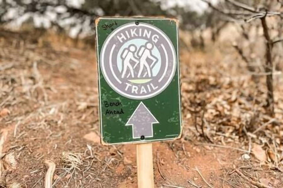 Follow the sign posted next to the hot tub to a private bench with views of Garden of the Gods!