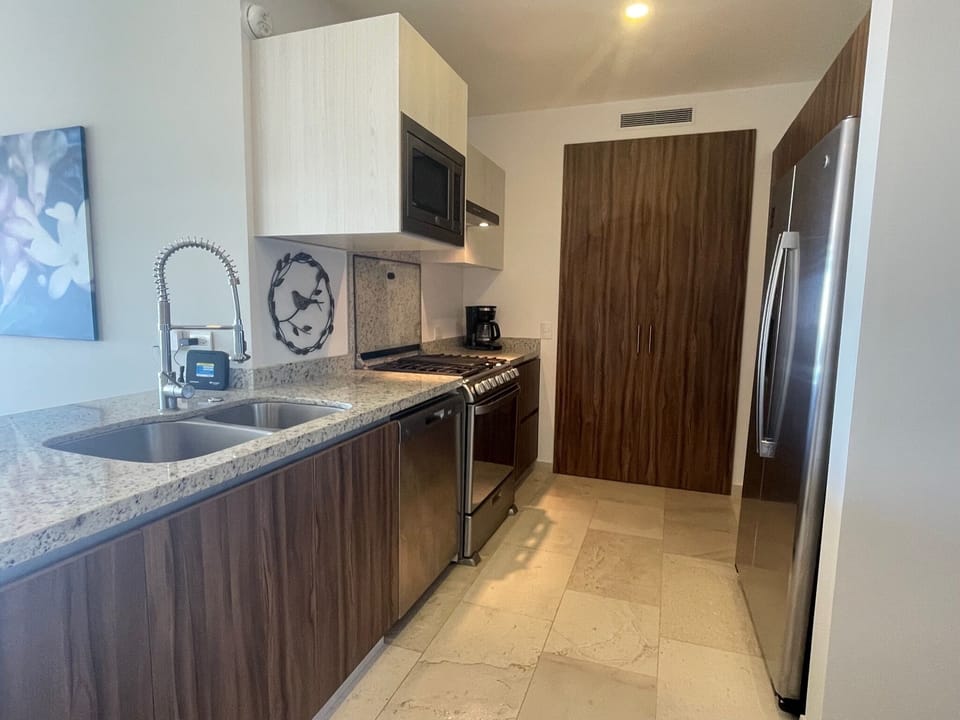 Fully equipped kitchen with everything needed for cooking and eating.