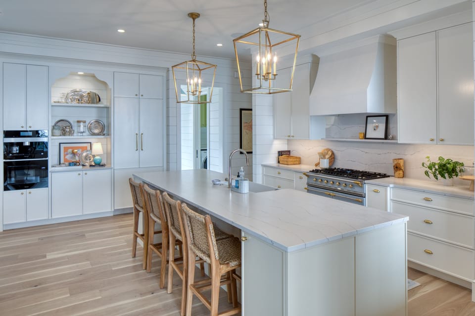 Another view of kitchen with laundry in the background
