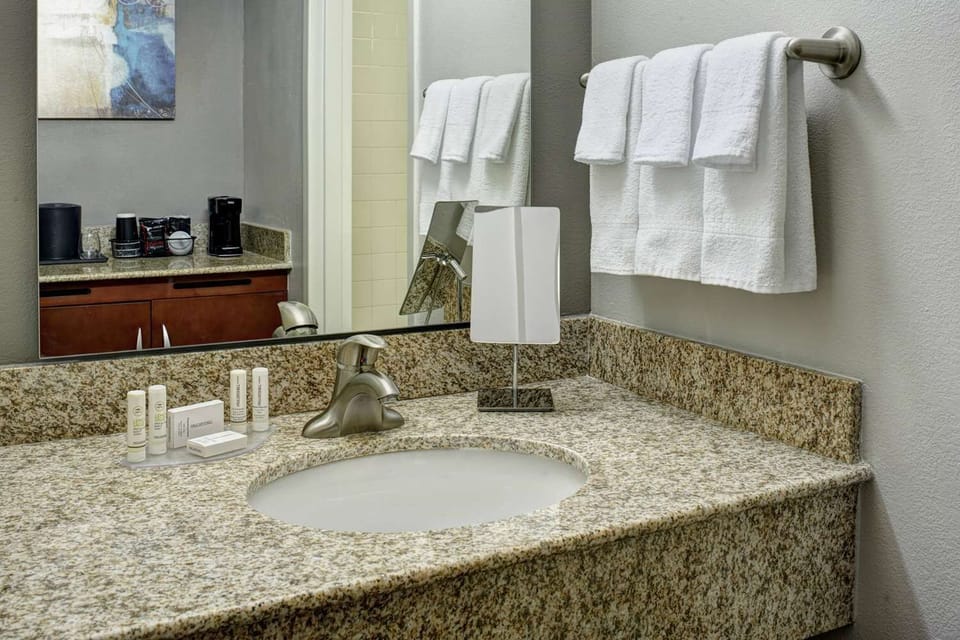 Full bathroom with a shower. Basic toiletries and towels are provided