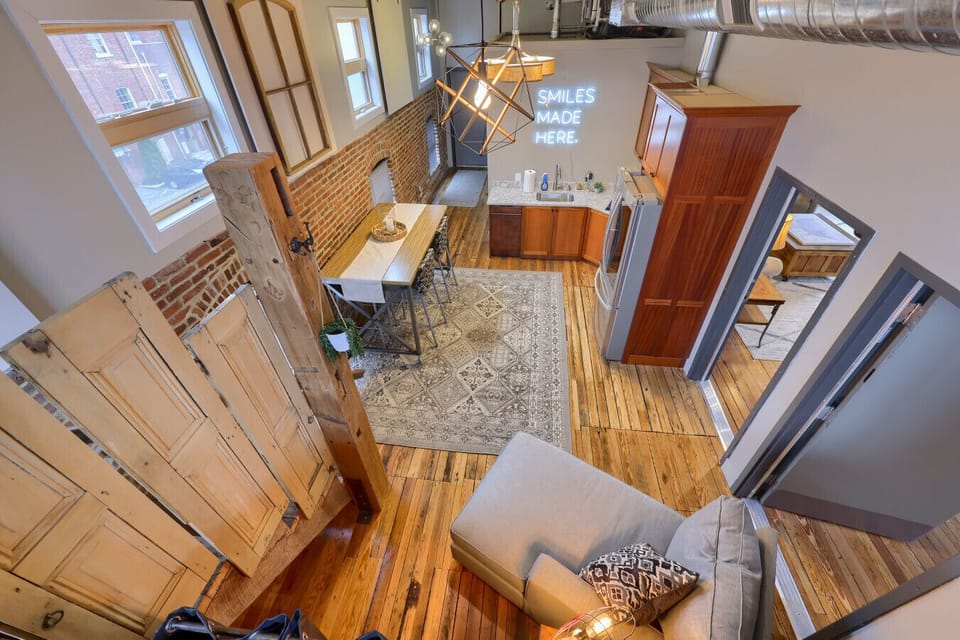 High Ceilings , Original Hardwood Floors and More!