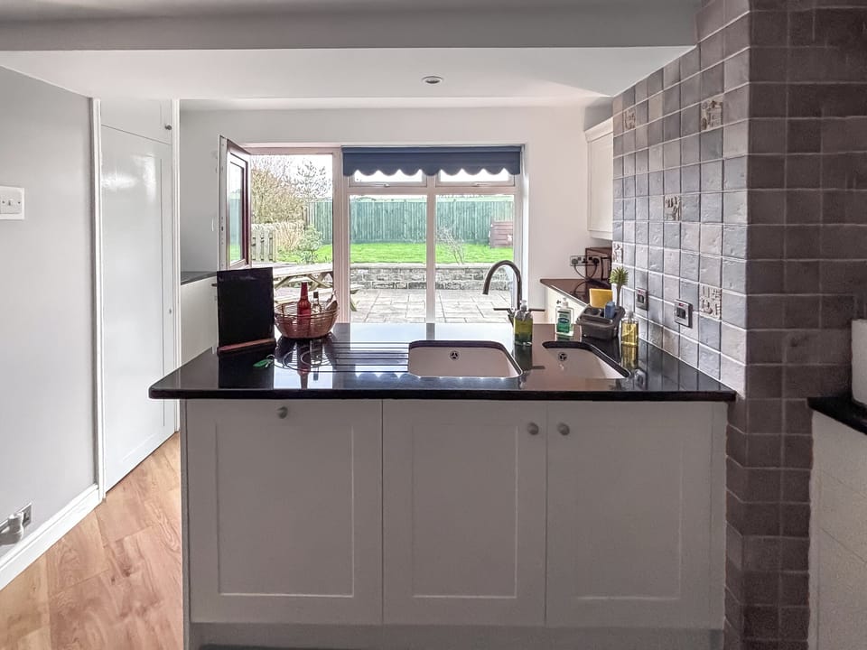 Beacon Cottage with view out to the patio area | Beacon - High Peak House, Ravenscar, near Whitby