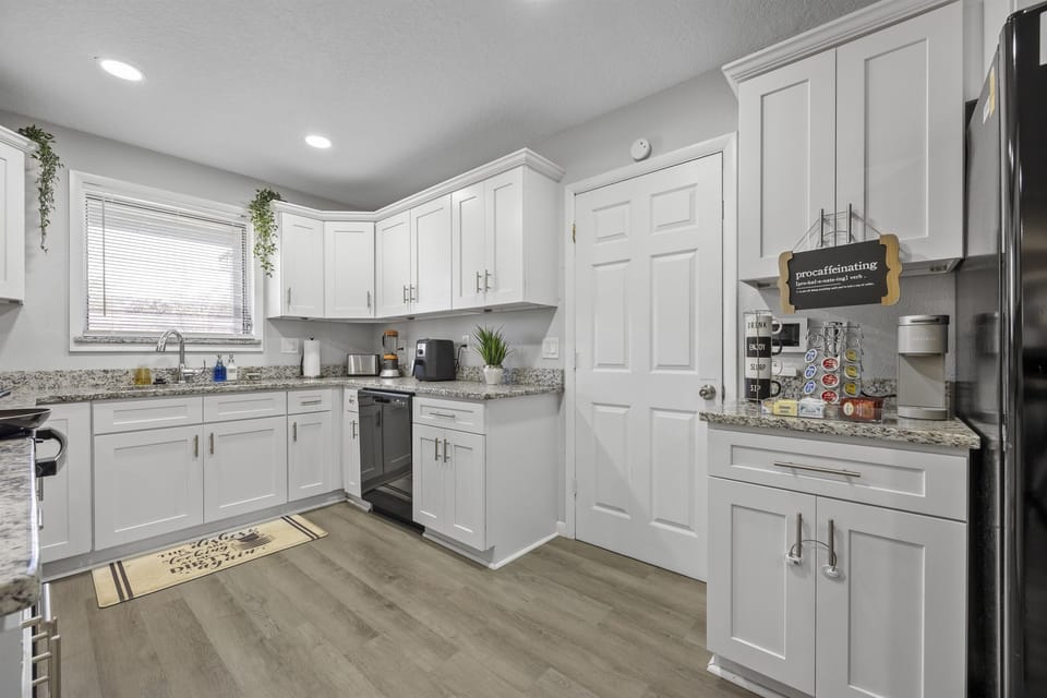 Bright and open fully equipped kitchen where it will be a delight to share meals and moments with family.