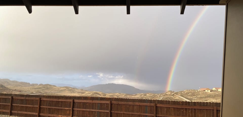 The back patio view of the sky, after a stormy afternoon.