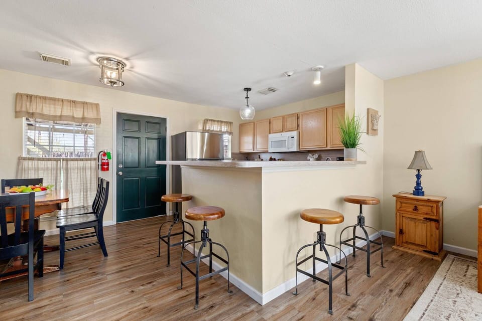 Whether you're enjoying a casual meal or sipping drinks at the counter, this dining space adds a touch hominess.