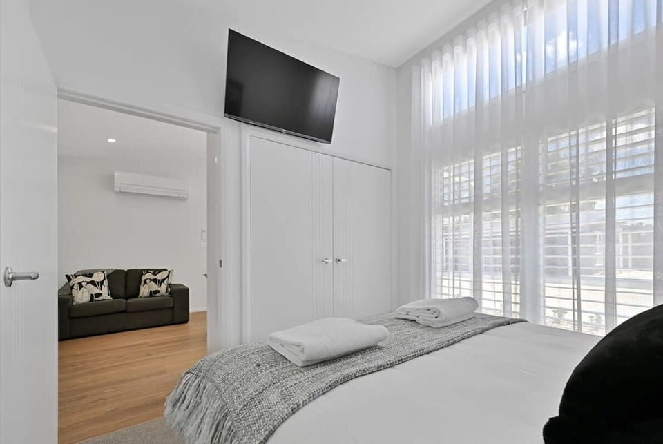 Bedroom - Queen Bed + Second Smart TV