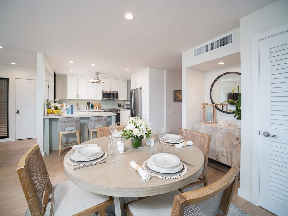 Newly remodeled kitchen and dining for four with bar seating for two and...