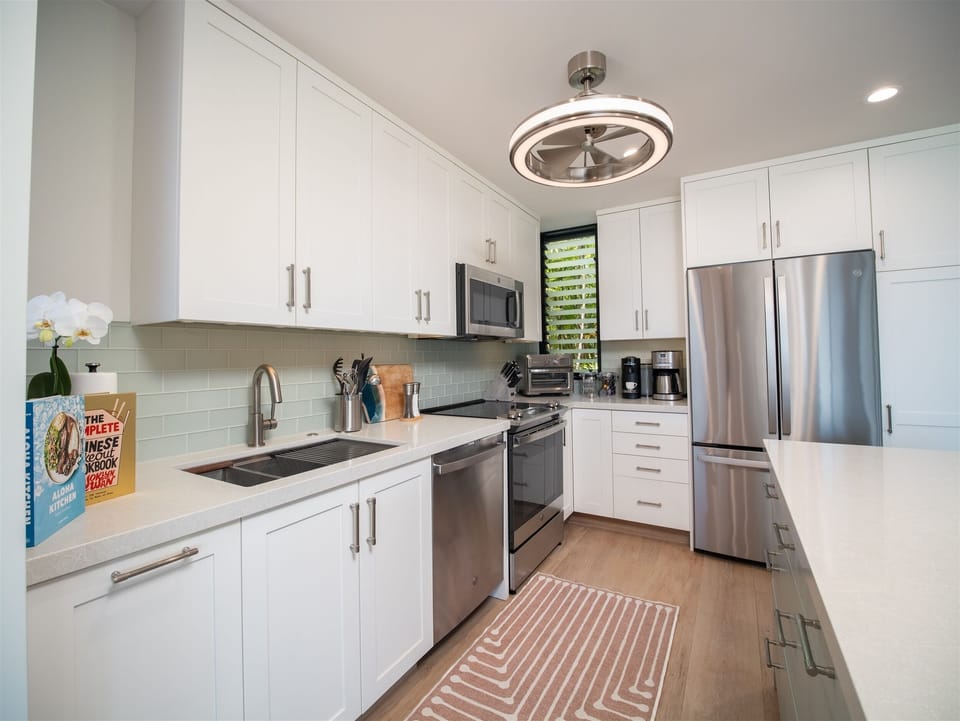 Newly remodeled kitchen and dining for four with bar seating for two and...