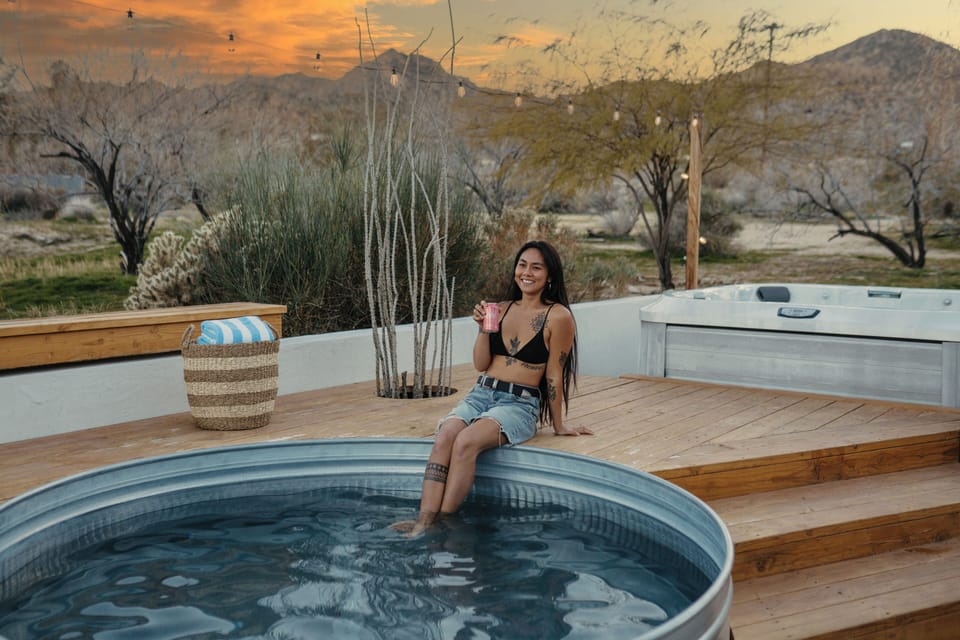 Desert oasis: plunge pool, hot tub, string lights, sunset views