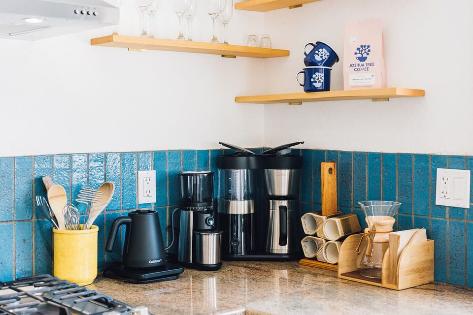 Whether you’re a coffee connoisseur or a casual drinker, this kitchen has everything you need to brew the perfect cup. We provide free local Joshua Tree Coffee Co. beans, and you can choose from a standard drip coffee maker, pour-over Chemex, Aeropress, or French press. Enjoy your morning brew on the porch while taking in the stunning sunrise over the mountains.
