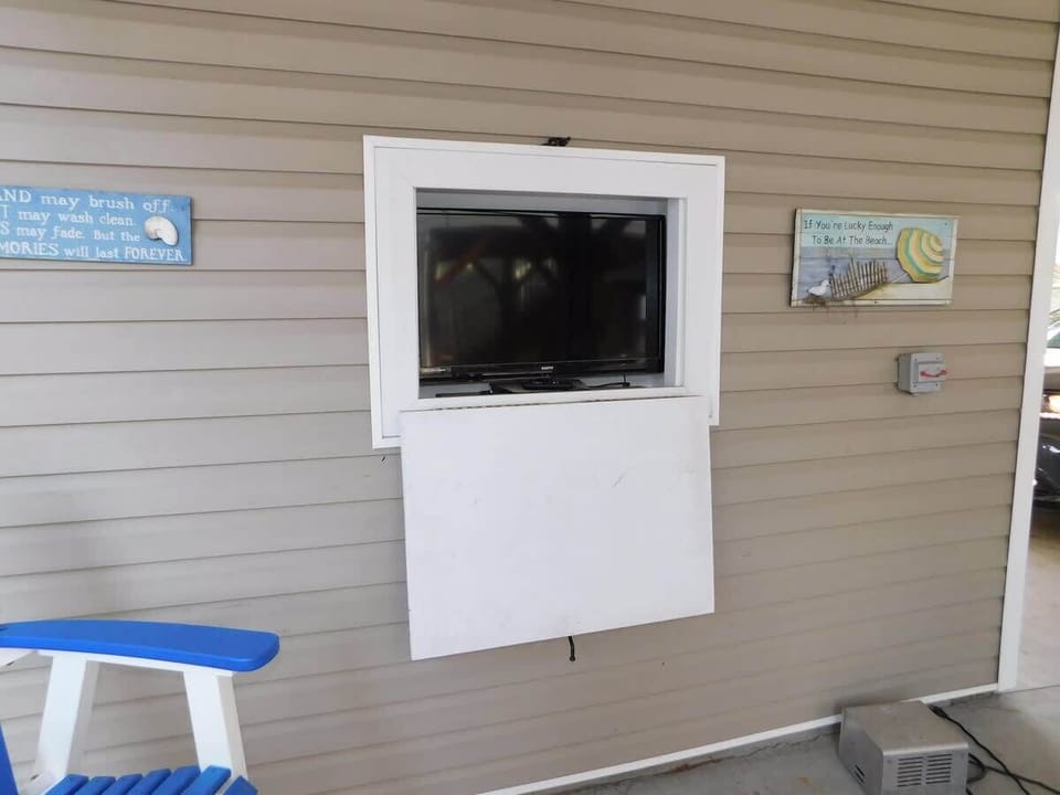 Tv under home