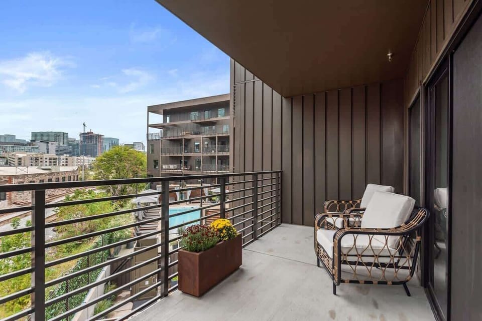 Balcony with gorgeous pool view and seating