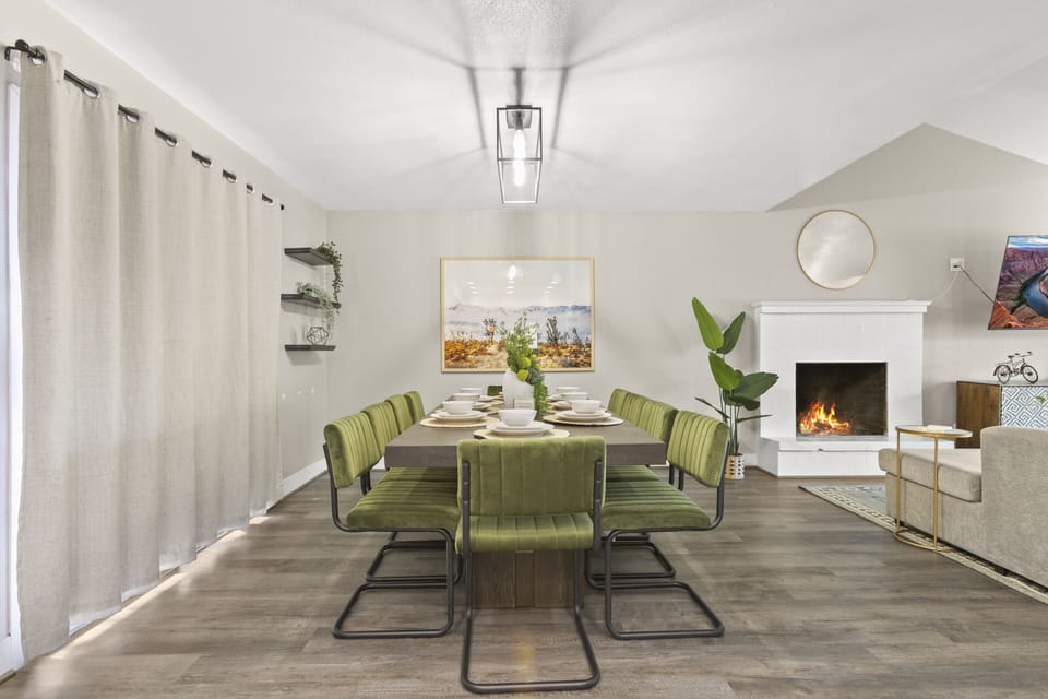 The dining area has windows with room darkening curtains