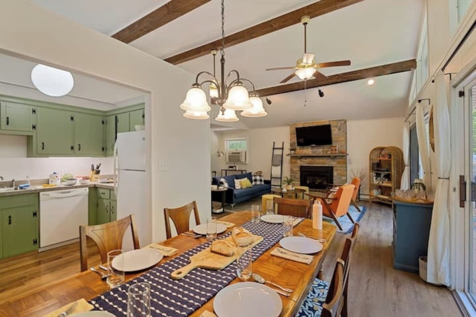 After a day in the sun, gather around the dining room table to toast a perfect vacation, or clear the dishes and break out a puzzle or board game!
