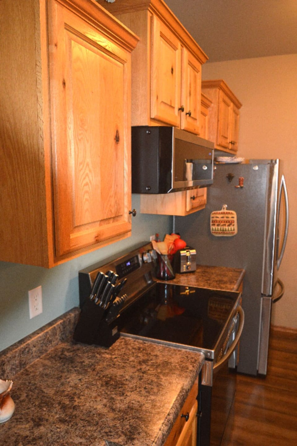 New stainless steel appliance kitchen with quality cookware and dishes