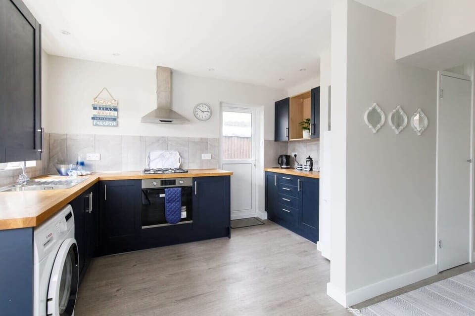 The good sized kitchen has everything you need for your stay.