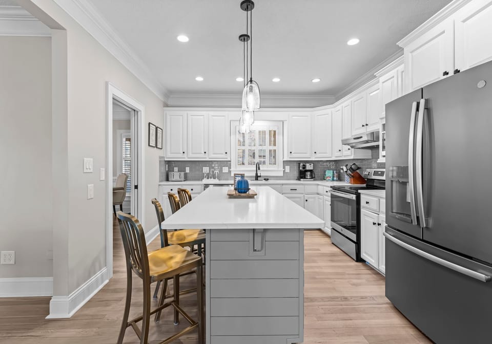 Remolded, fully stocked kitchen with new appliances and countertops.