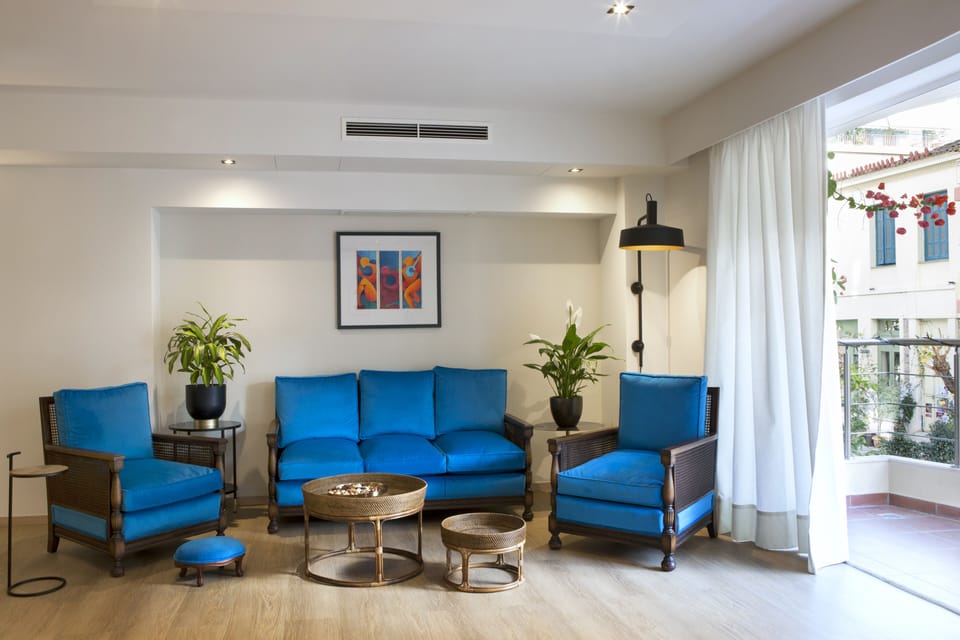 Living room with view to one of a few preservable buildings in the neighborhood.