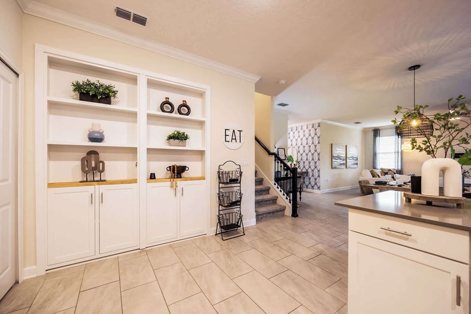 Spacious and stylish living area with modern decor and cozy ambiance, perfect for relaxing and entertaining.