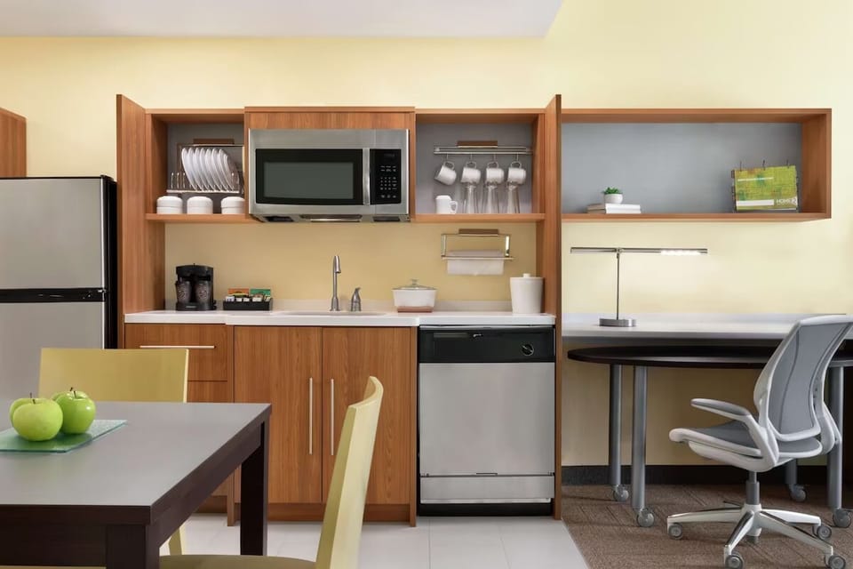 Settle in with a handy kitchenette and spacious work zone.
