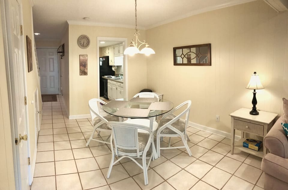 Enjoy meals together in this bright dining space, just steps from the kitchen and cozy living area!