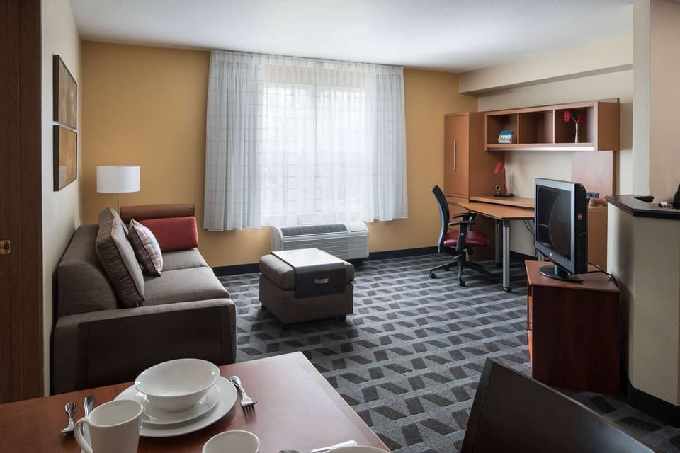 Get work done comfortably at the dedicated desk and seating.